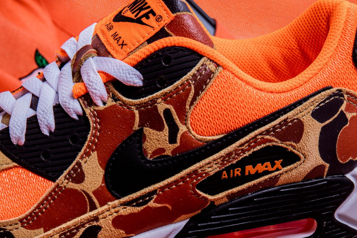 The Vibrant Duck Camouflage, Nike Air Max 90 “Orange Camo” has arrived at JUICE!